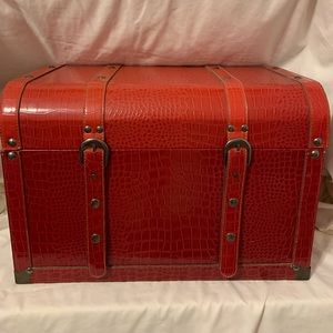 Red Hinged Chest that snaps closed